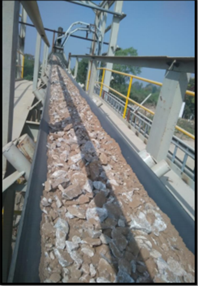 Limestone conveyed across the belt